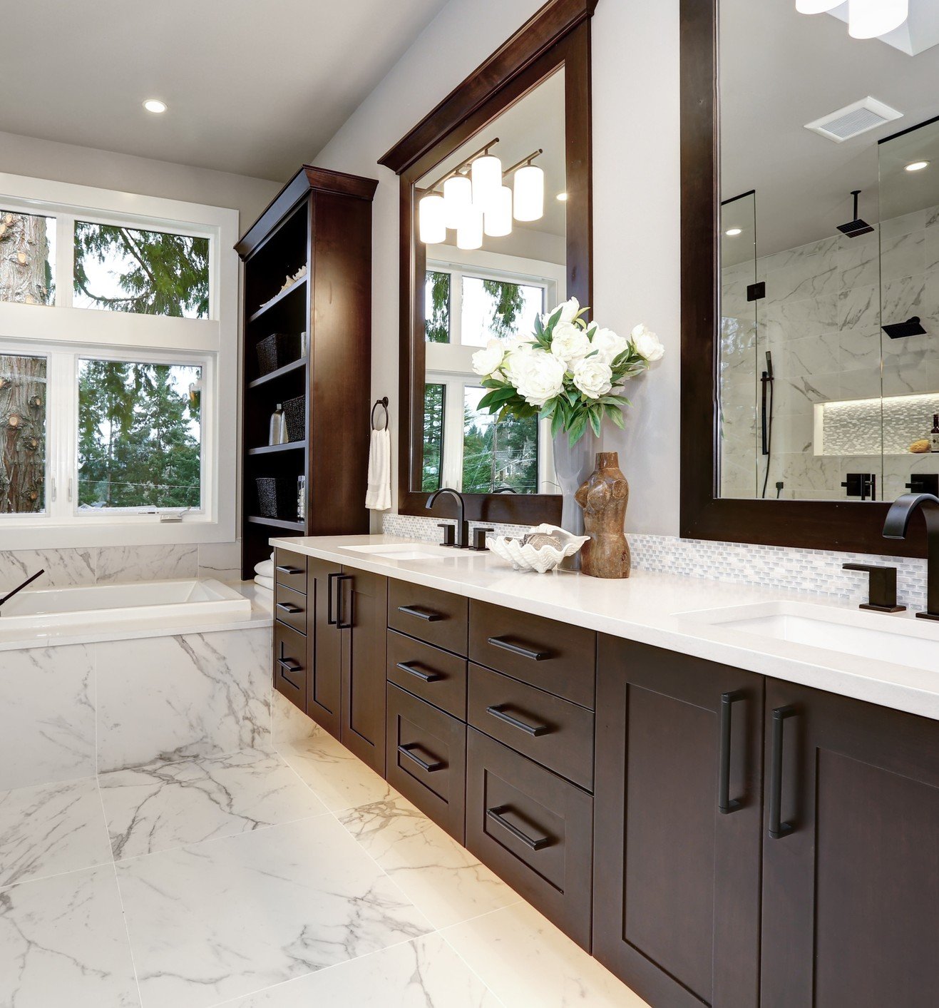 White tile with dark wood cabinets make this Houston, TX, bathroom look amazing!