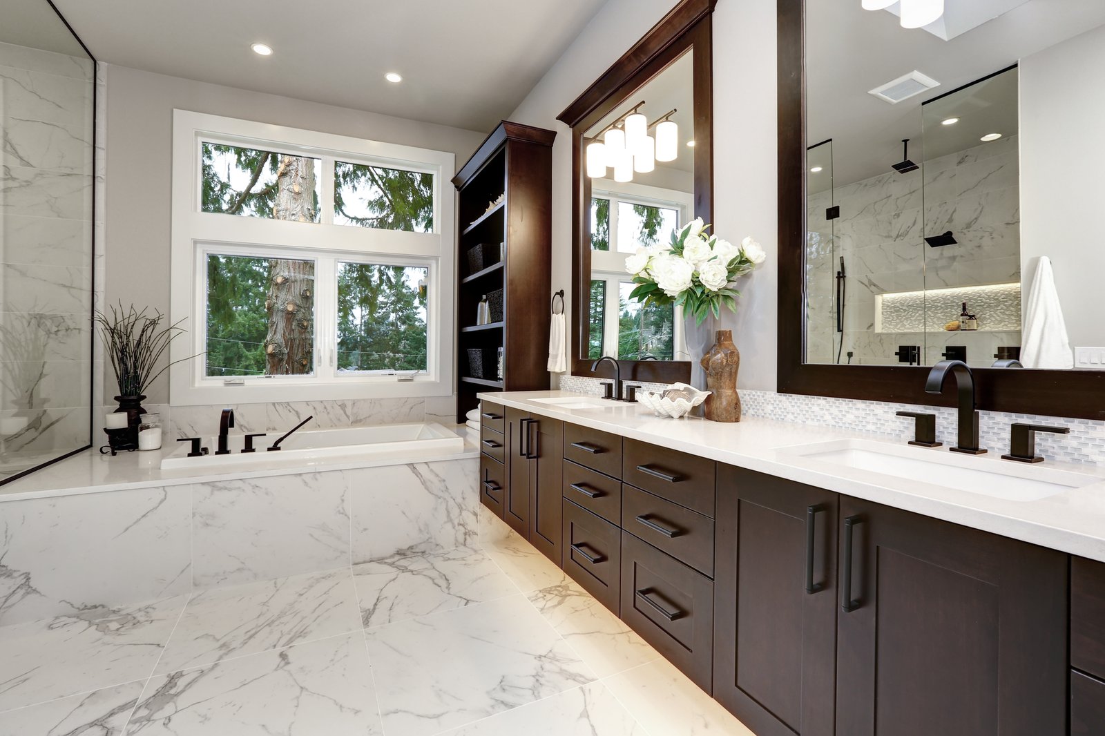 Beautiful bathroom with tile floors and marble countertop.